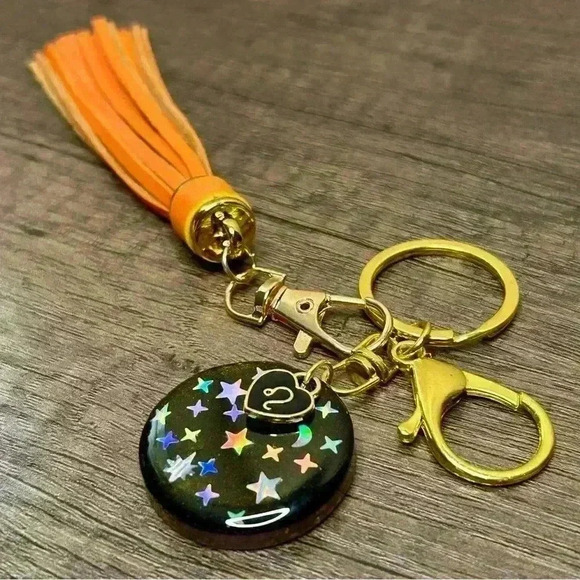 Hand Crafted Medallion Leo Charm and Orange Tassel Gold Tone Keychain - Picture 1 of 2